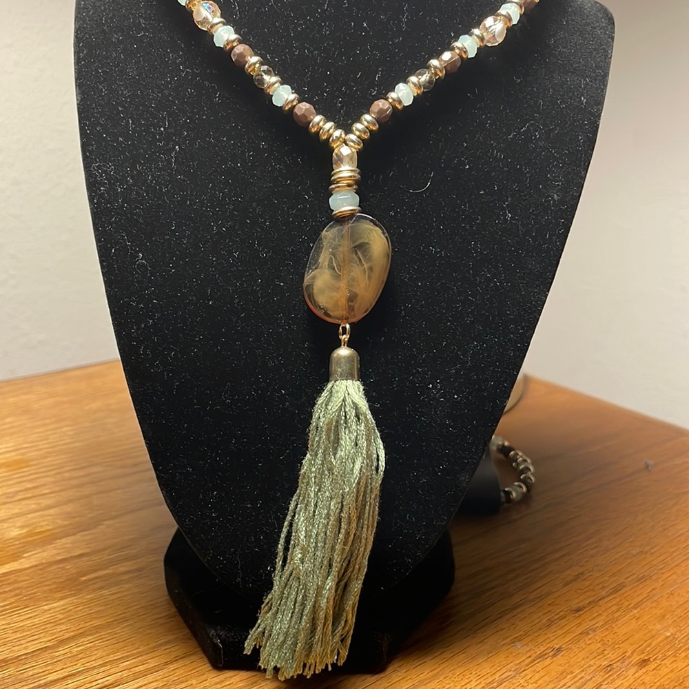 Long (21 inches) boho green and brown set of necklace and earrings.